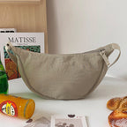 Halbmond-Umhängetasche mit verstellbarem Riemen -    Zorenza