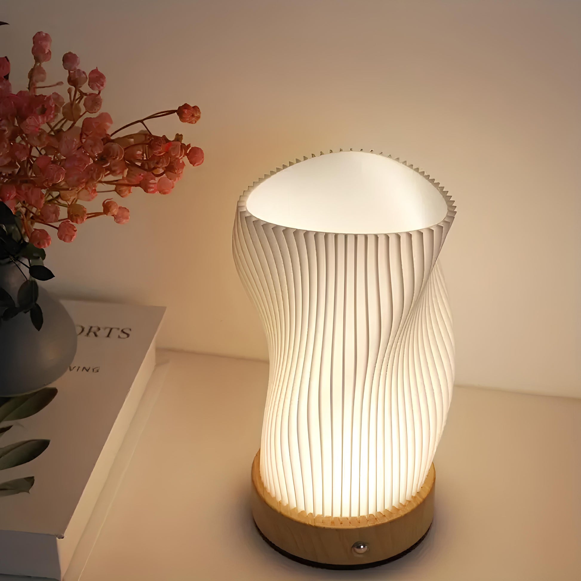 Tischleuchte mit Wellendesign und LED-Licht -    Zorenza