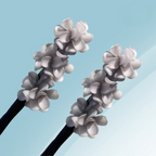 Haar-Duttmacher mit Blumenverzierung -    Zorenza