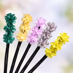 Haar-Duttmacher mit Blumenverzierung -    Zorenza