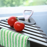 Corner kitchen organizer – water flows directly into the sink