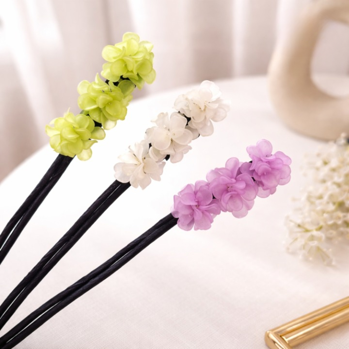 Haar-Duttmacher mit Blumenverzierung -    Zorenza