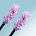 Haar-Duttmacher mit Blumenverzierung -    Zorenza