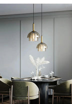 Pendelleuchte mit Doppelglas und Gold-Details -    Zorenza