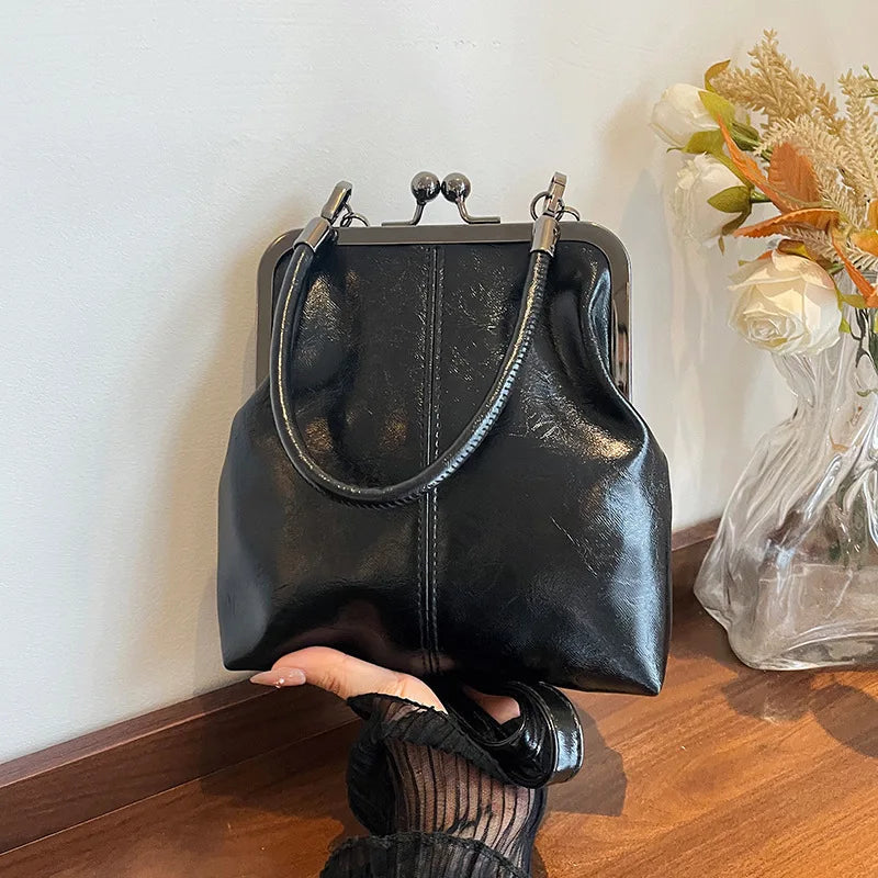 Handtasche Kunstleder mit Vintage-Bügelverschluss -    Zorenza
