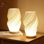 Tischleuchte mit Wellendesign und LED-Licht -    Zorenza