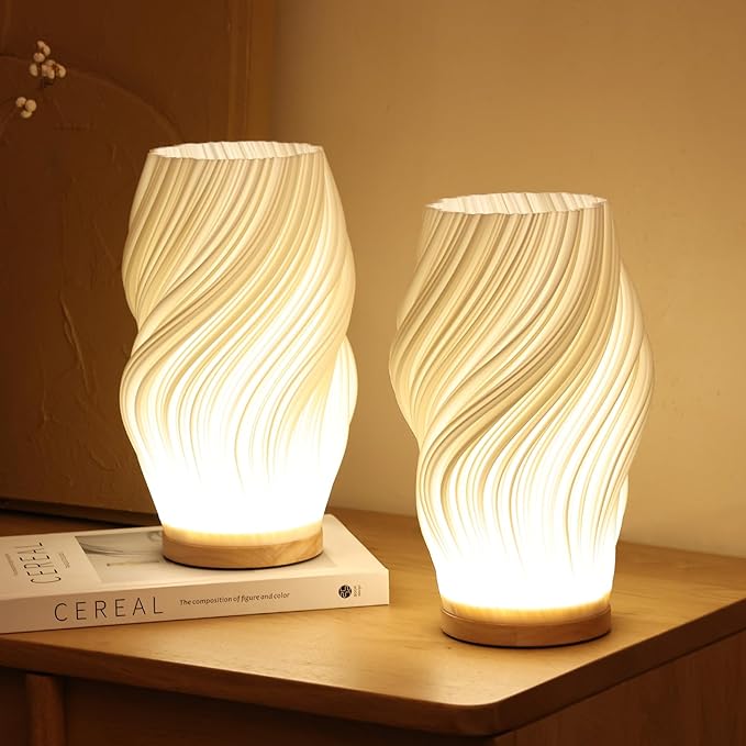 Tischleuchte mit Wellendesign und LED-Licht -    Zorenza