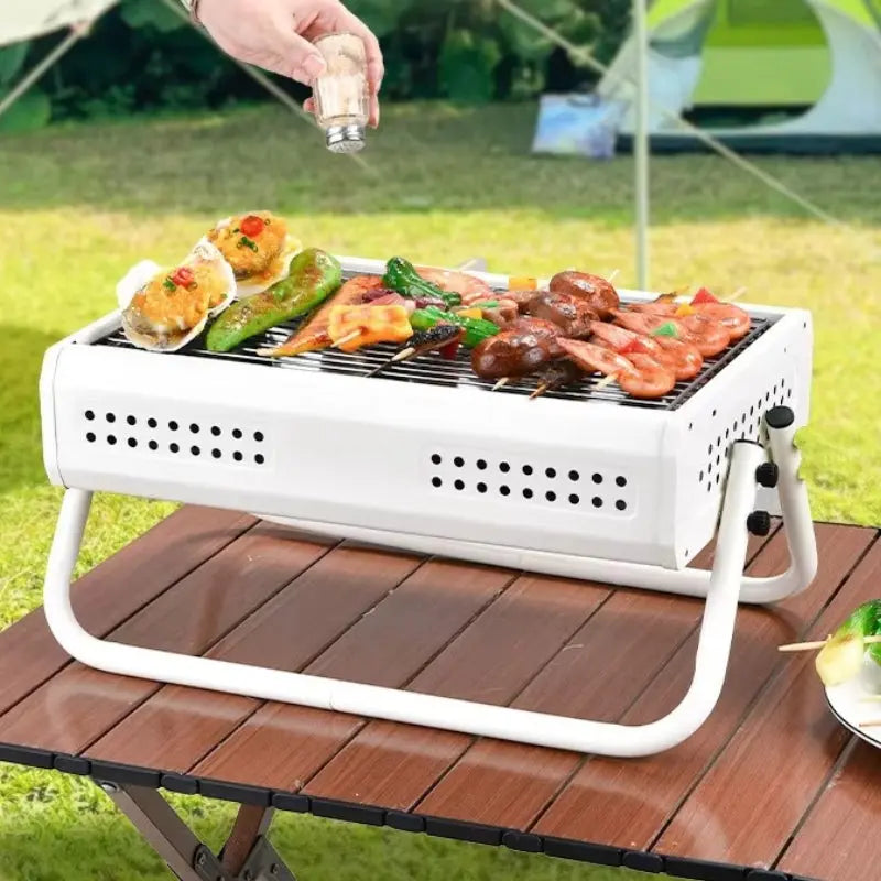 Tragbarer Holzkohlegrill – Klappbar mit umfunktionalen Griffen Zorenza
