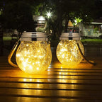 Solar-Gartenlaterne aus Glas mit LED-Lichterkette -    Zorenza