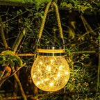 Solar-Gartenlaterne aus Glas mit LED-Lichterkette -    Zorenza